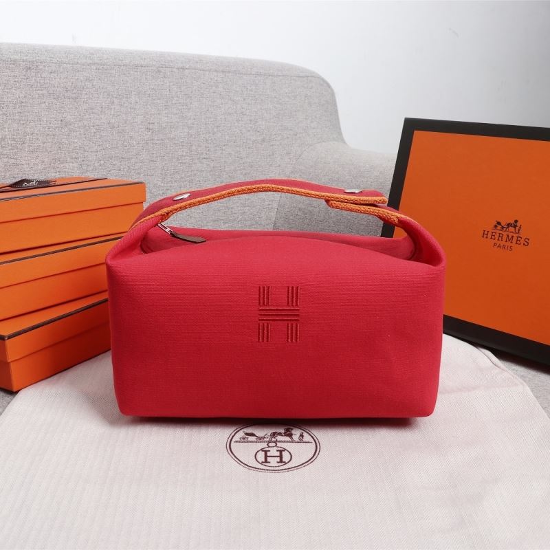 H**mes clutch bags